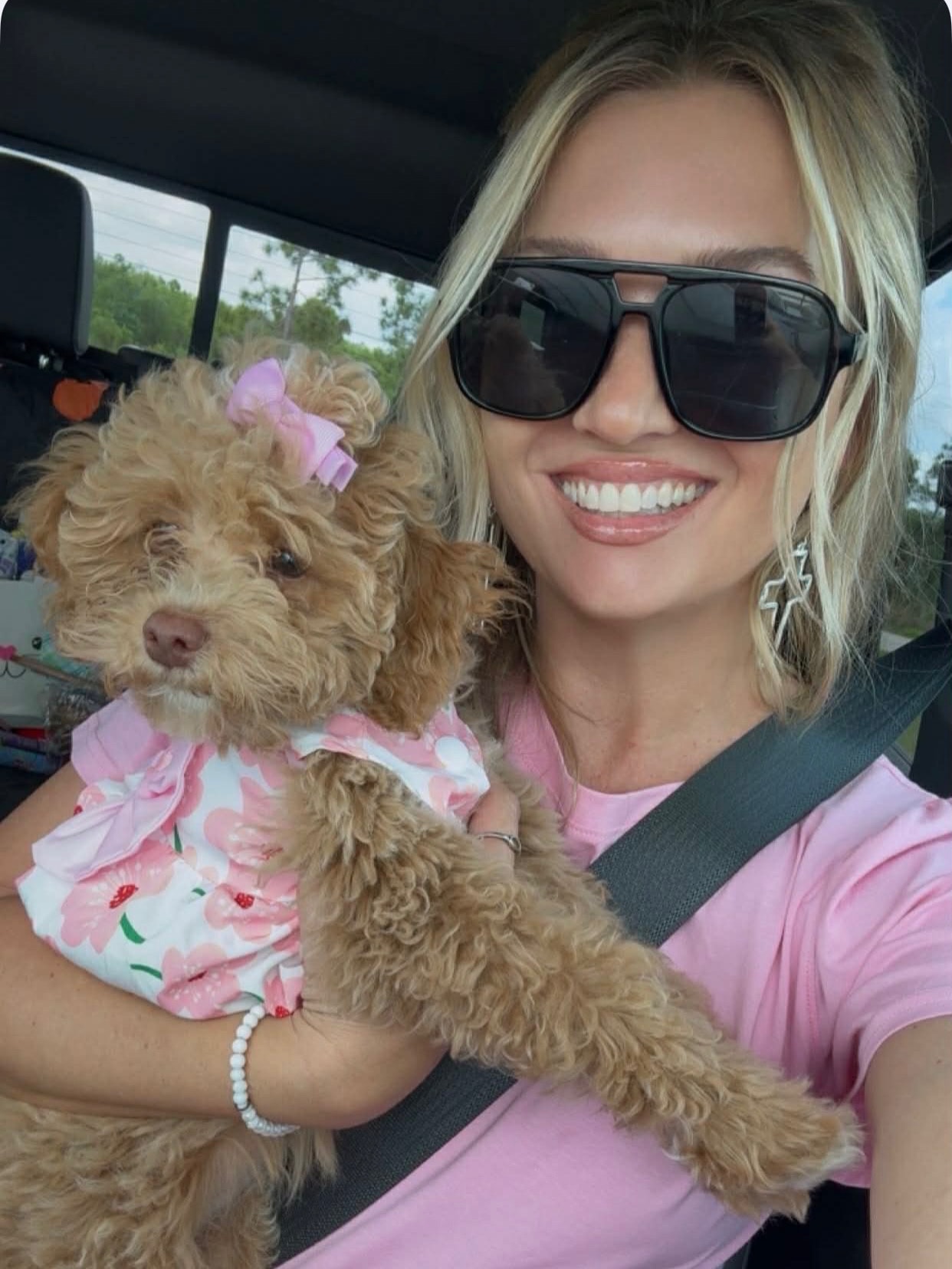 Happy doodle puppy with family